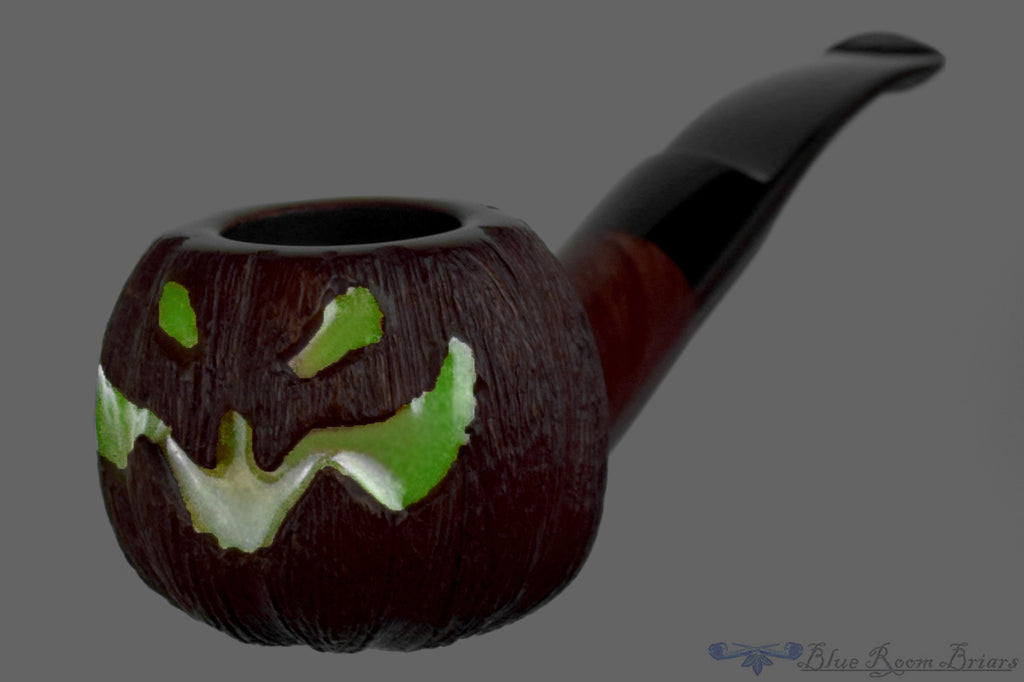 Blue Room Briars is proud to present this Blue Room Briars Pipe 2026 Halloween Bent Carved Glow in the Dark Jack-O'-Lantern