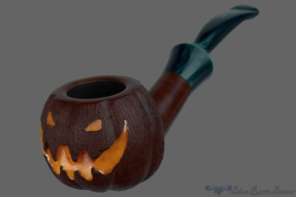 Blue Room Briars is proud to present this Blue Room Briars Pipe 2026 Halloween Bent Carved Glow in the Dark Jack-O'-Lantern