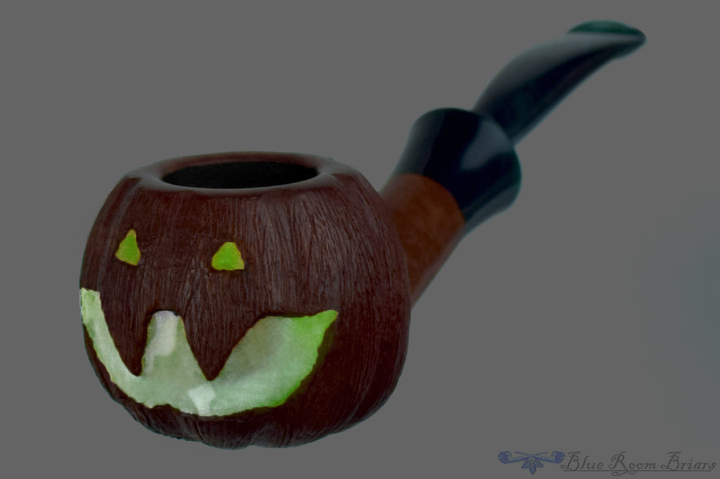 Blue Room Briars is proud to present this Blue Room Briars Pipe 2026 Halloween Bent Carved Glow in the Dark Jack-O'-Lantern