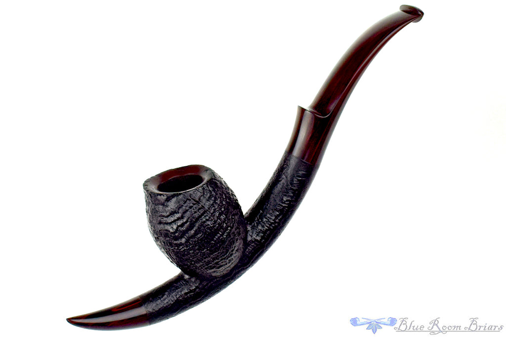 Blue Room Briars is proud to present this Jesse Jones 2025 Halloween Pipe Large Bent Sandblast Cavalier with Brindle