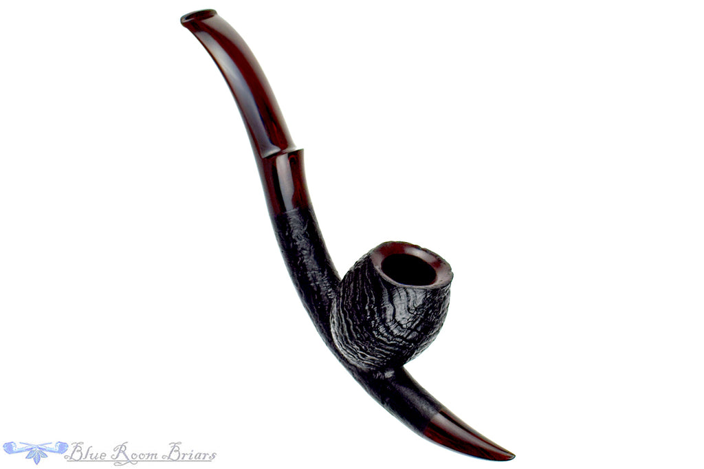 Blue Room Briars is proud to present this Jesse Jones 2025 Halloween Pipe Large Bent Sandblast Cavalier with Brindle