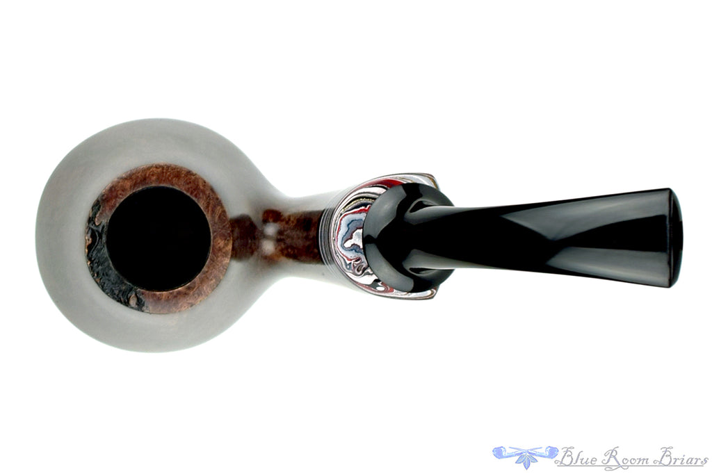 Blue Room Briars is proud to present this Marinko Neralić Pipe Full Bent Volcano with Fordite