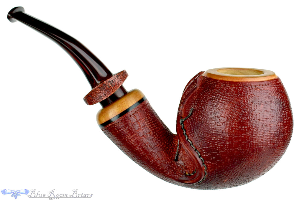 Blue Room Briars is proud to present this Dragomir Aleksic Pipe Carved Olivewood Apple with Brindle