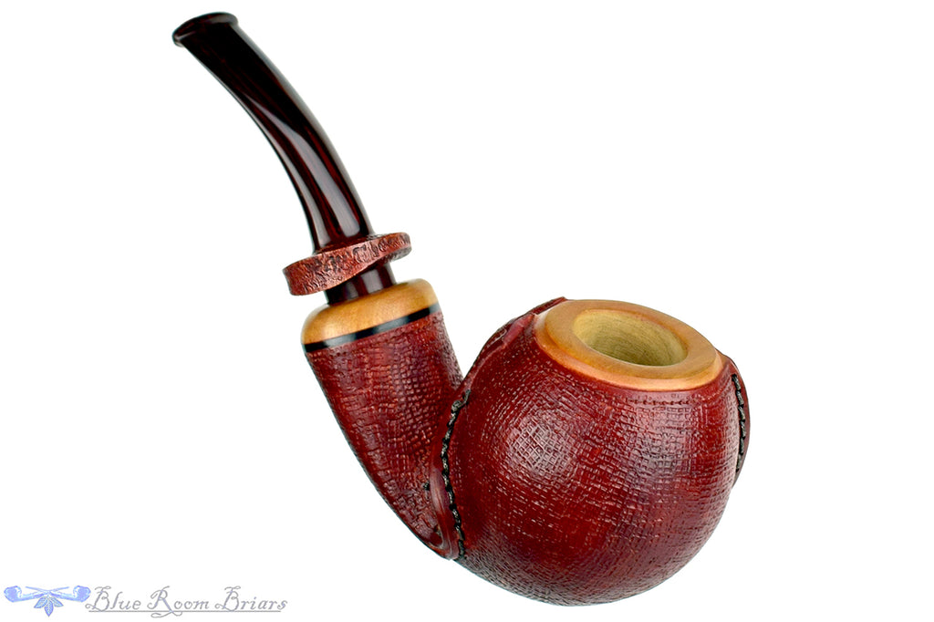 Blue Room Briars is proud to present this Dragomir Aleksic Pipe Carved Olivewood Apple with Brindle