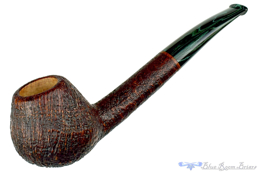 Blue Room Briars is proud to present this Bill Walther Pipe Bent Sandblast Oval Shank Cognac with Green Brindle