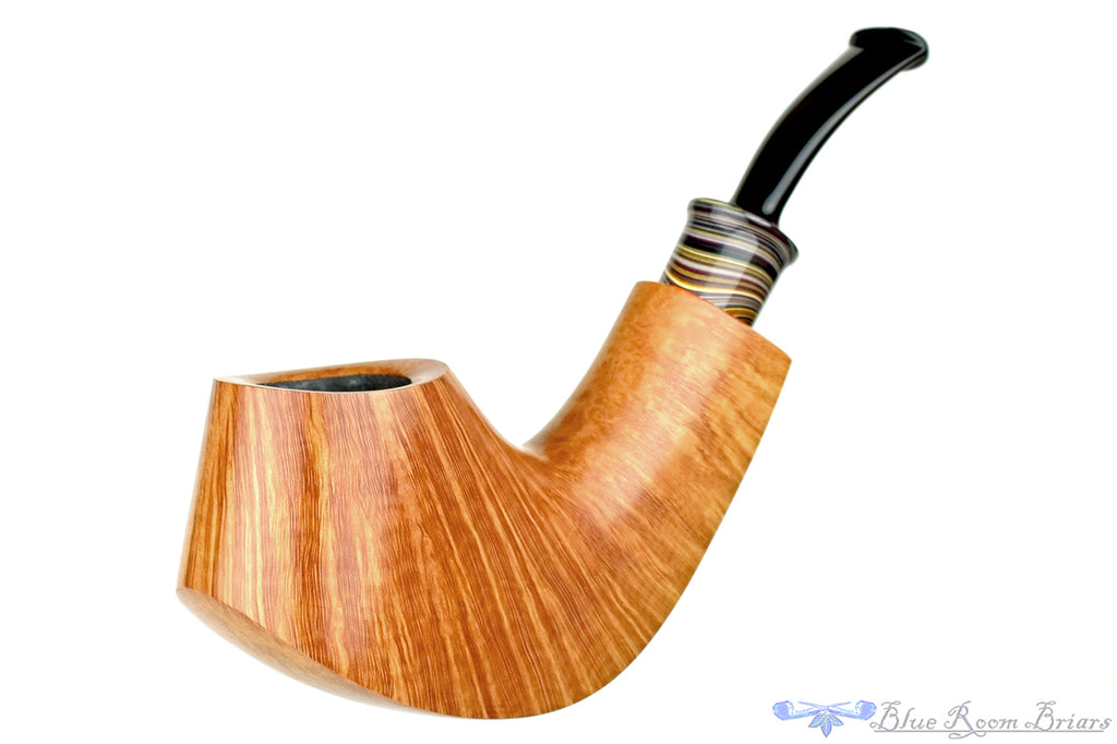 Blue Room Briars is proud to present this Bill Shalosky Pipe 431 1/2 Bent Natural Volcano with Fordite