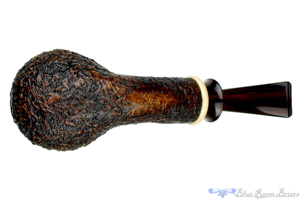 Blue Room Briars is proud to present this Bill Shalosky Pipe 581 Bent Contrast Blast Brandy with Mammoth Ivory and Brindle