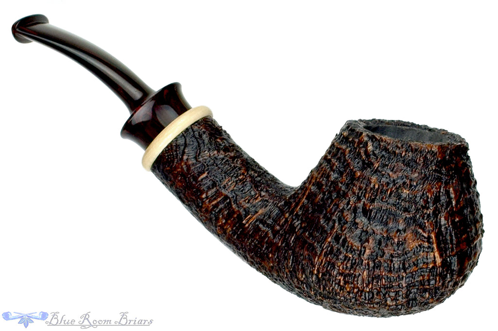 Blue Room Briars is proud to present this Bill Shalosky Pipe 581 Bent Contrast Blast Brandy with Mammoth Ivory and Brindle